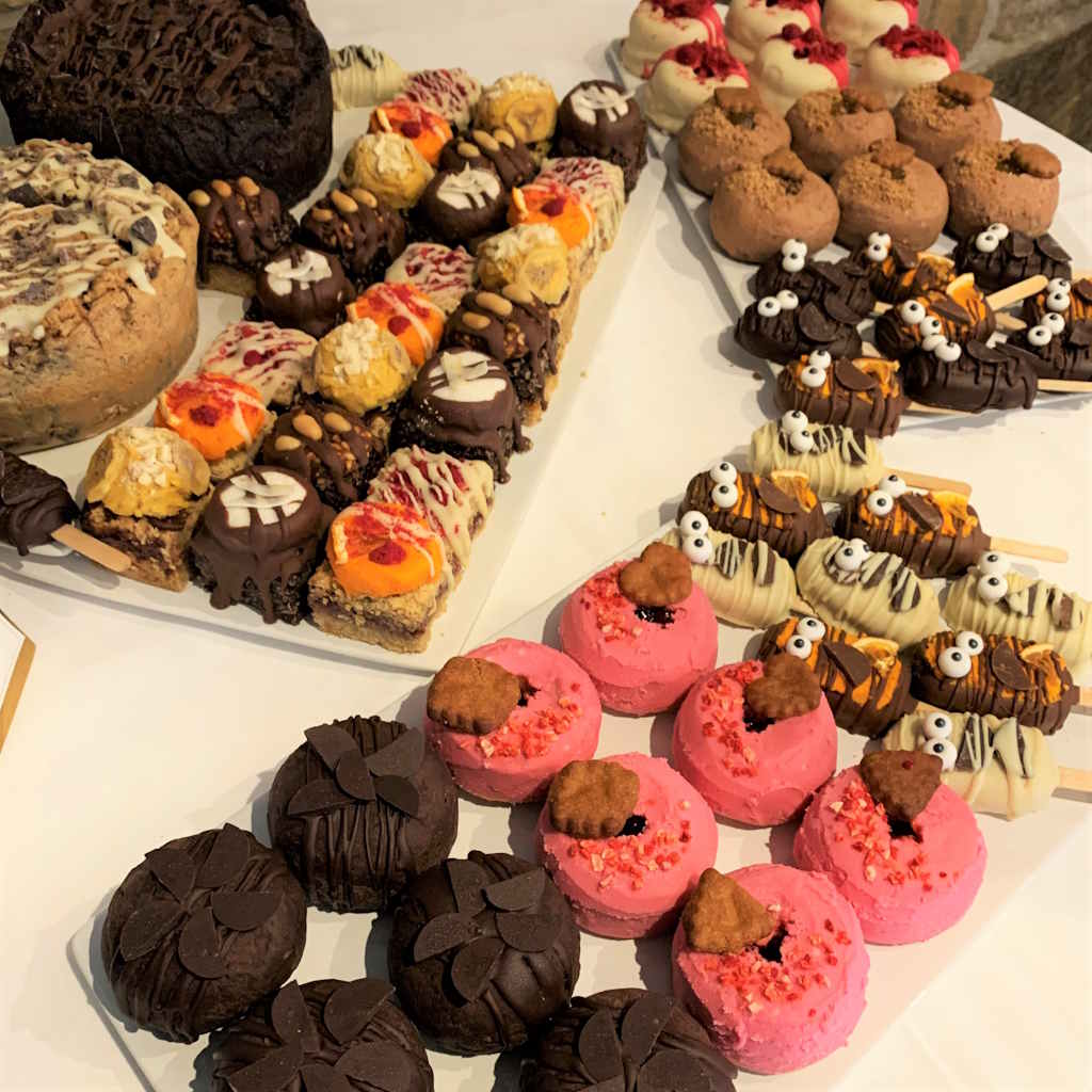 Full cookie pie dessert table vegan gluten-free treats doughnuts flapjacks magnums cake pops